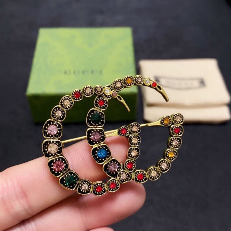 Gvc*1 brooches